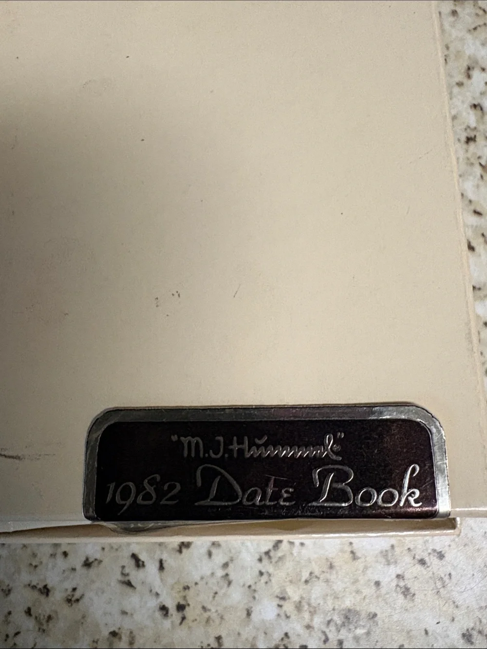 Hummel Cream Cover 1982 Date Book with Silver & Black Plaque